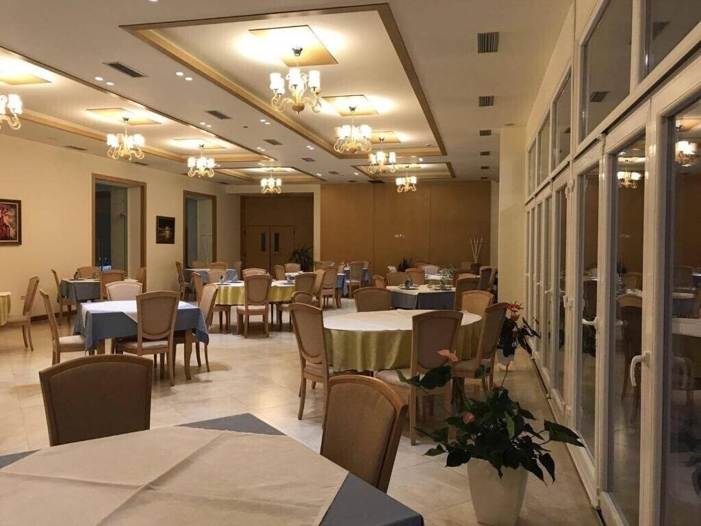 Апартаменты Grand White City Hotel 4*