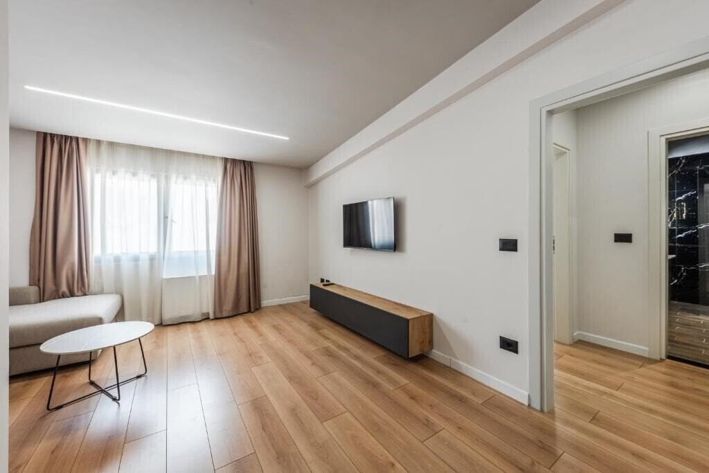 Апартаменты Relax Inn Hotel 4*