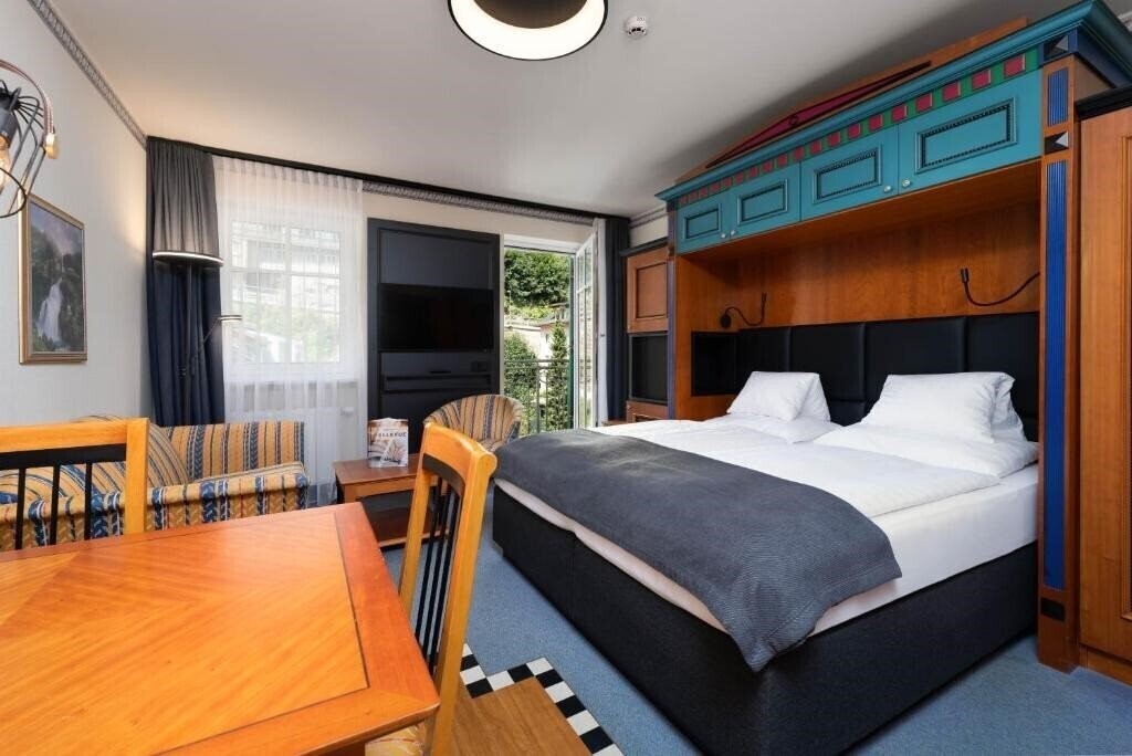 Отель Hotel & Apartment Mondi Holiday Bellevue 4*