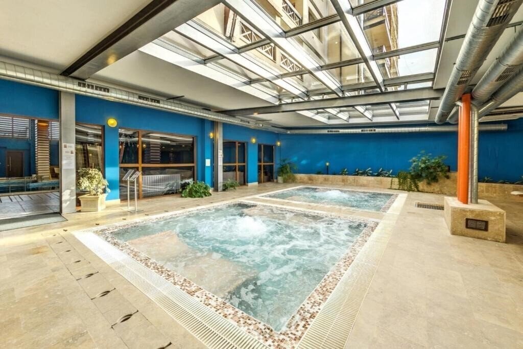 Вид Regnum Bansko SPA & Relax Aparthotel 5*
