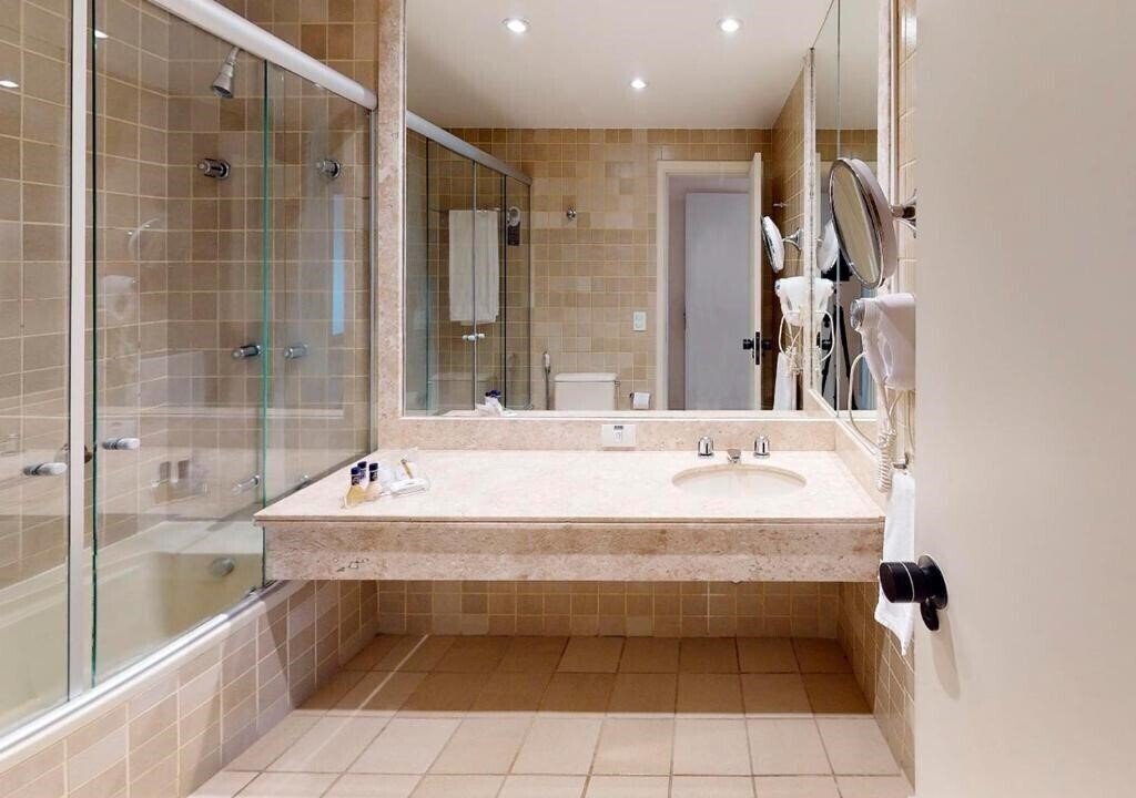 Фотографія Estanplaza Nacoes Unidas 4*