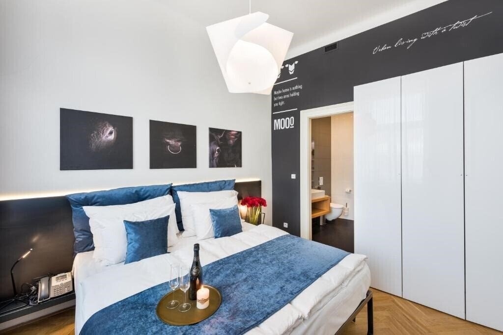 Апартаменти Mooo Apartments 4*