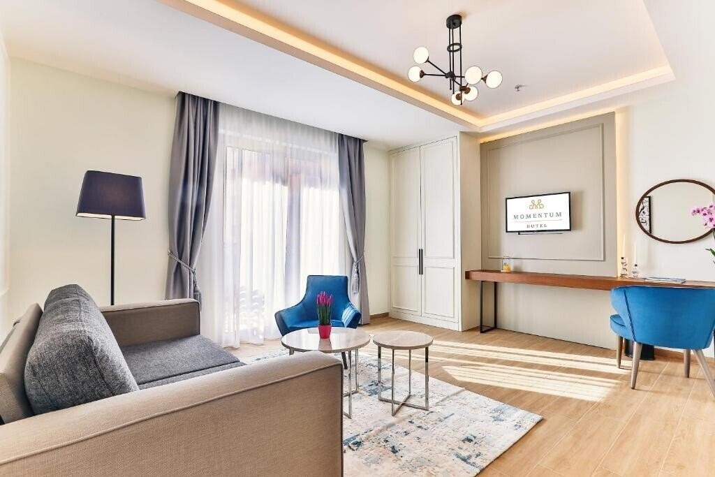 Апартаменти Momentum 4*