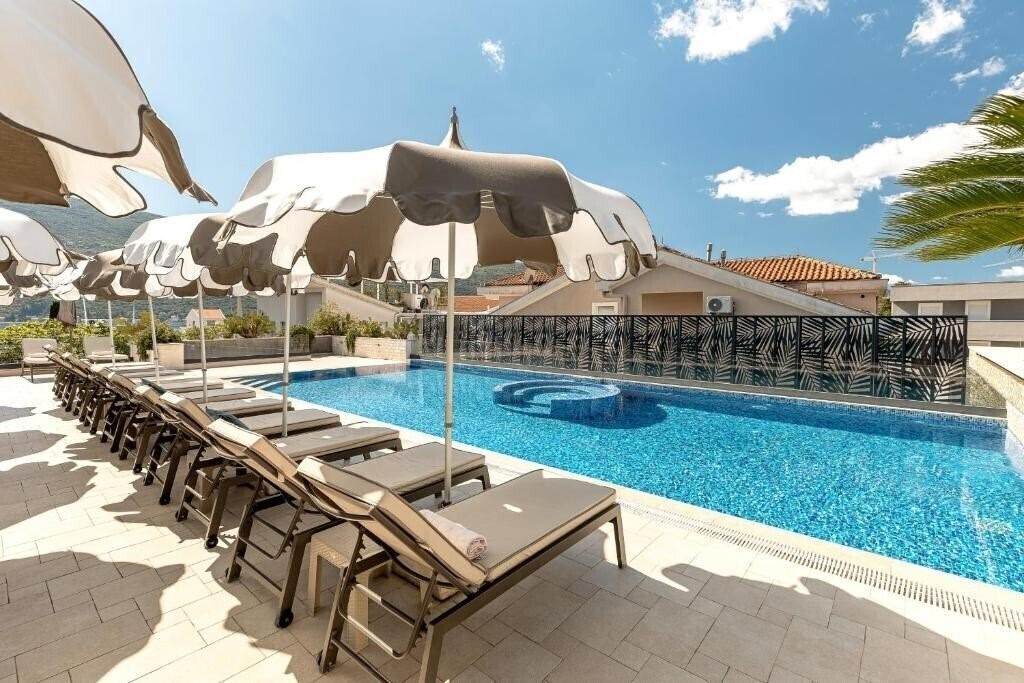 Фото Sun Village Apartments 4*