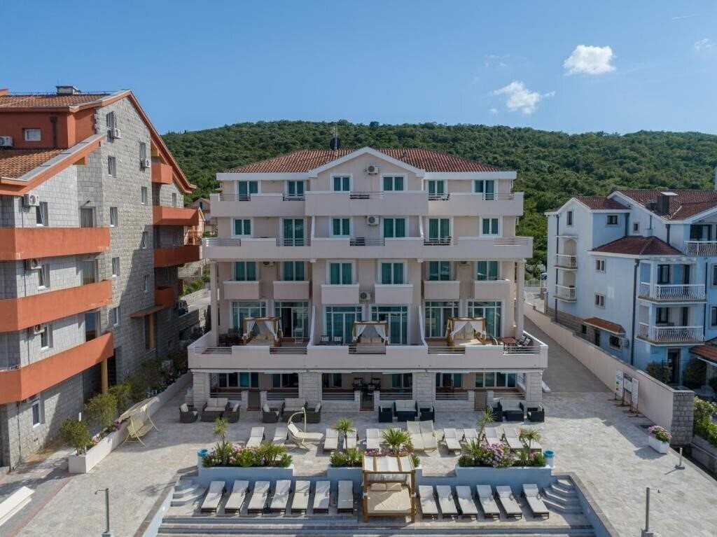 Фотографія Adeona Apartments 4*