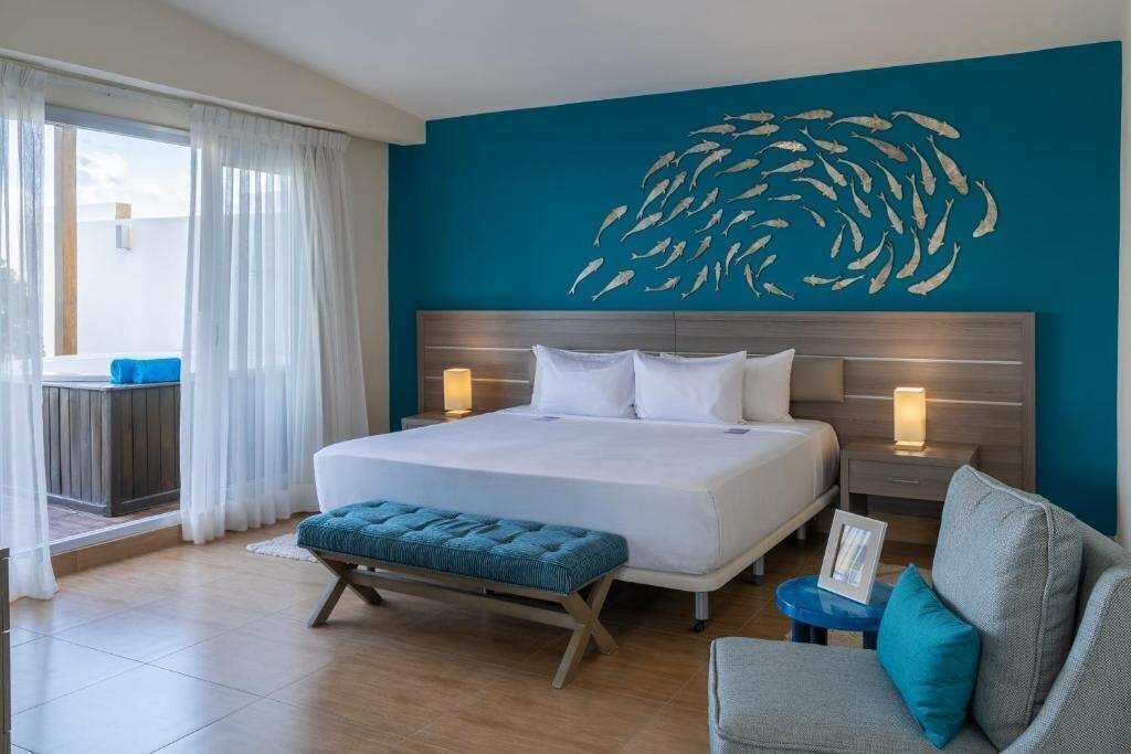 Апартаменты Bakour Punta Cana Suites (ex. Radisson Blu Resort & Residence Punta Cana, Blue Beach Punta Cana Luxury Resorts, Beach Front Luxury Apartment Bluebeach ) 5*