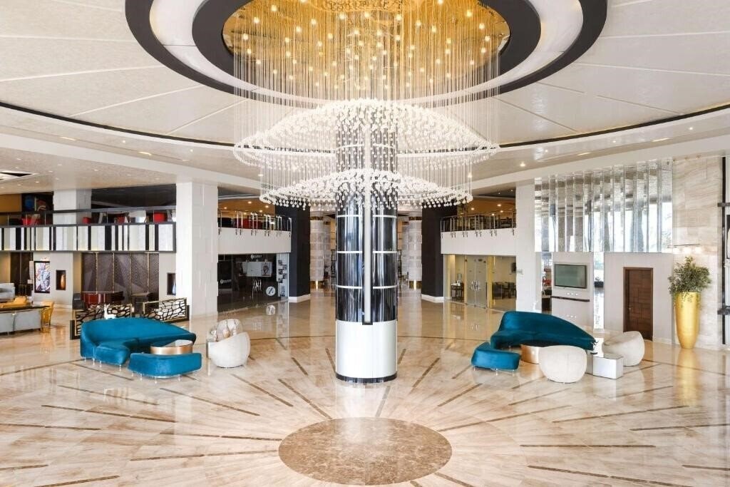 Апартаменты Radisson Blu Hotel 5*