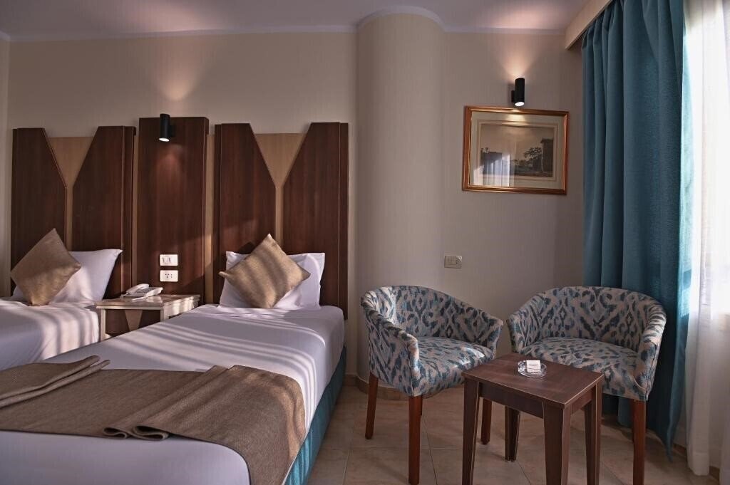 Панорама Swiss Inn Nile Hotel 3*