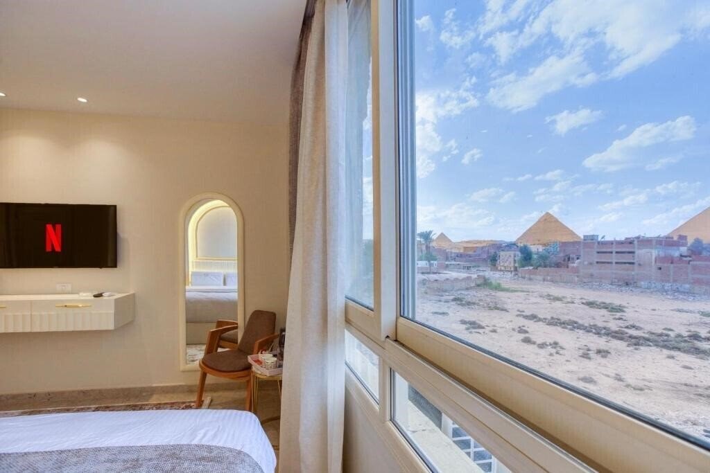 Апартаменты Pyramids Plateau Hotel 3*