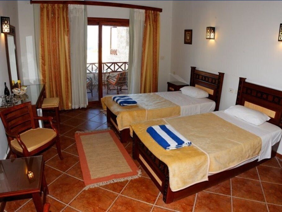 Фотографія The Oasis Dive Resort 3*