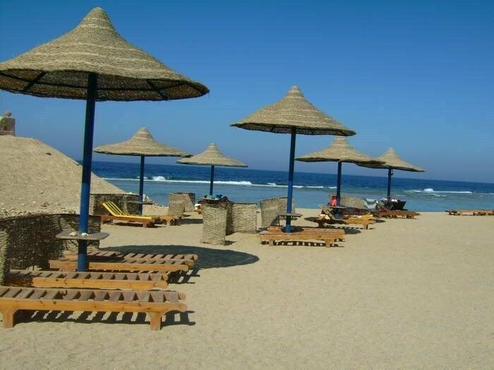 Апартаменты Carnelia Beach Resort 4*