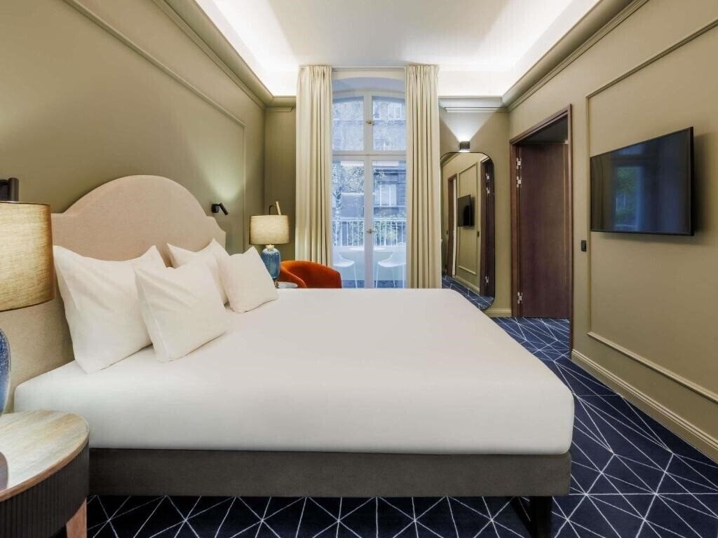 Апартаменты Movenpick Hotel 5*
