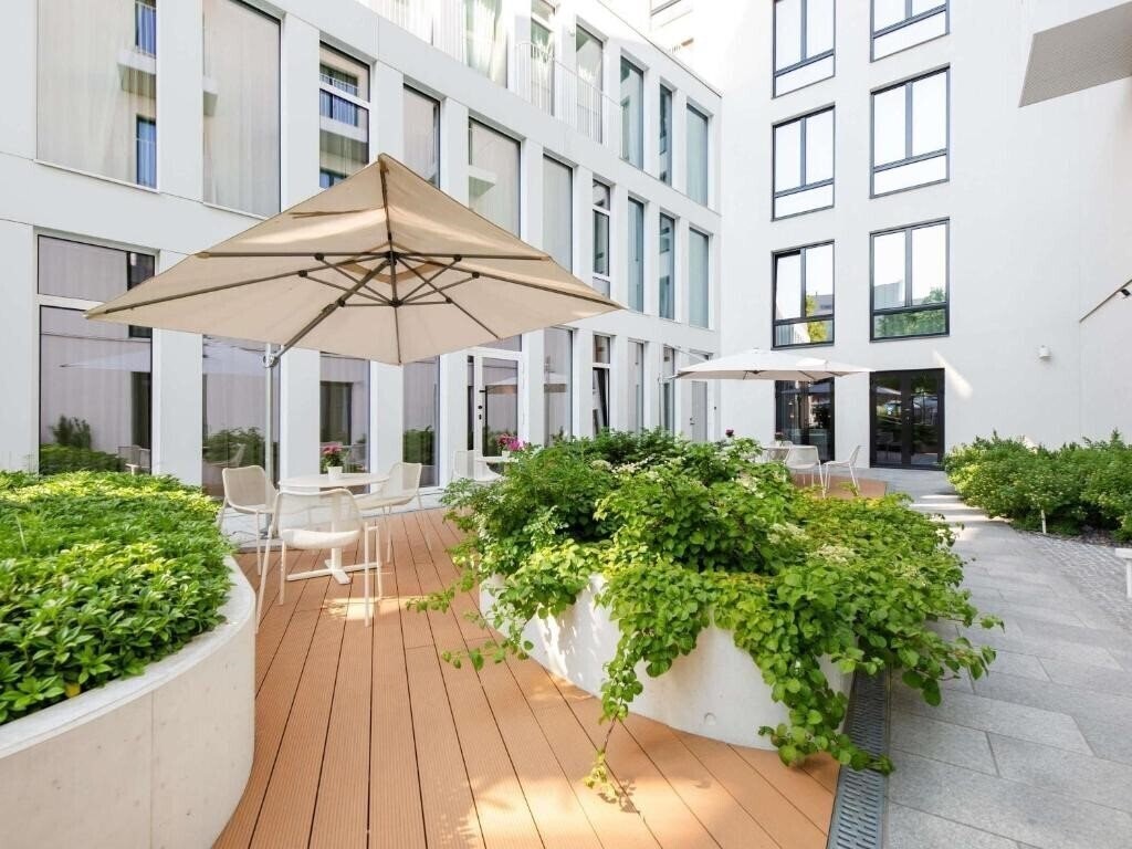 Фотография Movenpick Hotel 5*