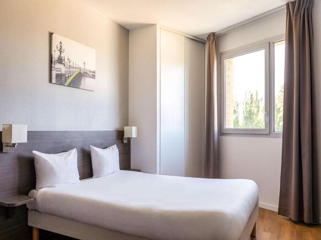 Фото Appart Hotel Paris Quai de Marne 3*