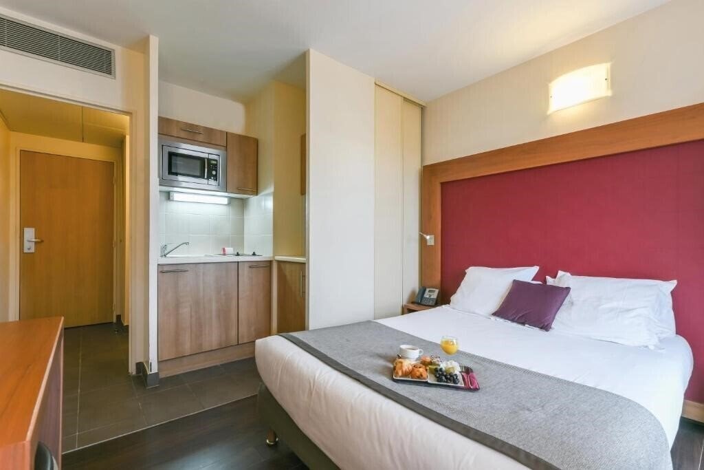 Апартаменти Appart’ City Confort Paris Grande Bibliotheque 4*