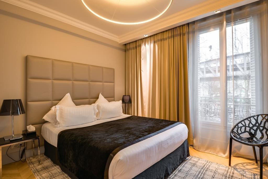 Фотографія First Hotel Paris Tour Eiffel 4*