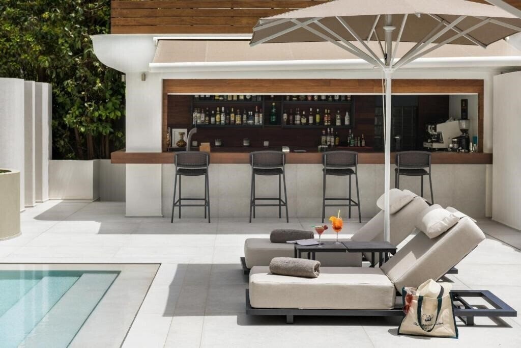 Фотография Blazer Suites 4*