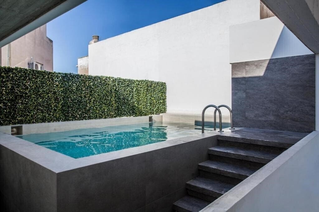 Отель Art Suites Korai 4*