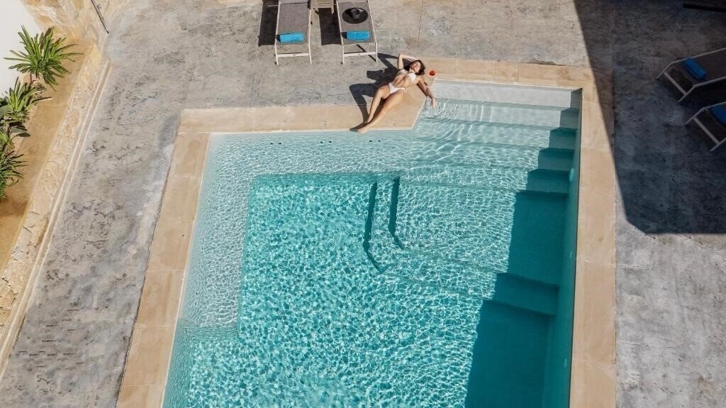 Готель Villaggio Mare Suites 4*