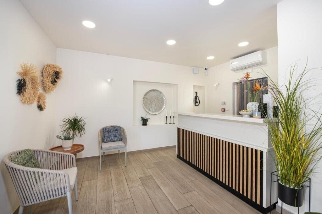 Апартаменти Villaggio Mare Suites 4*