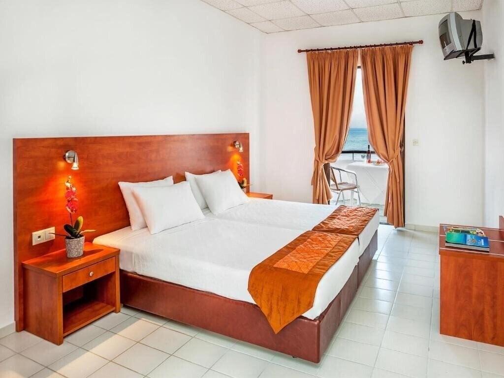 Вид Xenios Dolphin Beach 3*