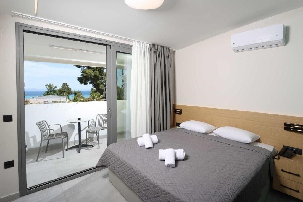 Фото Olympic Kosma Hotel & Villas 3*