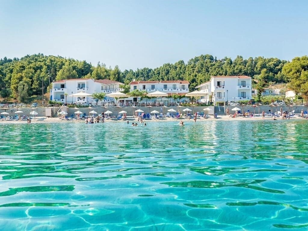 Готель Xenios Dolphin Beach 3*