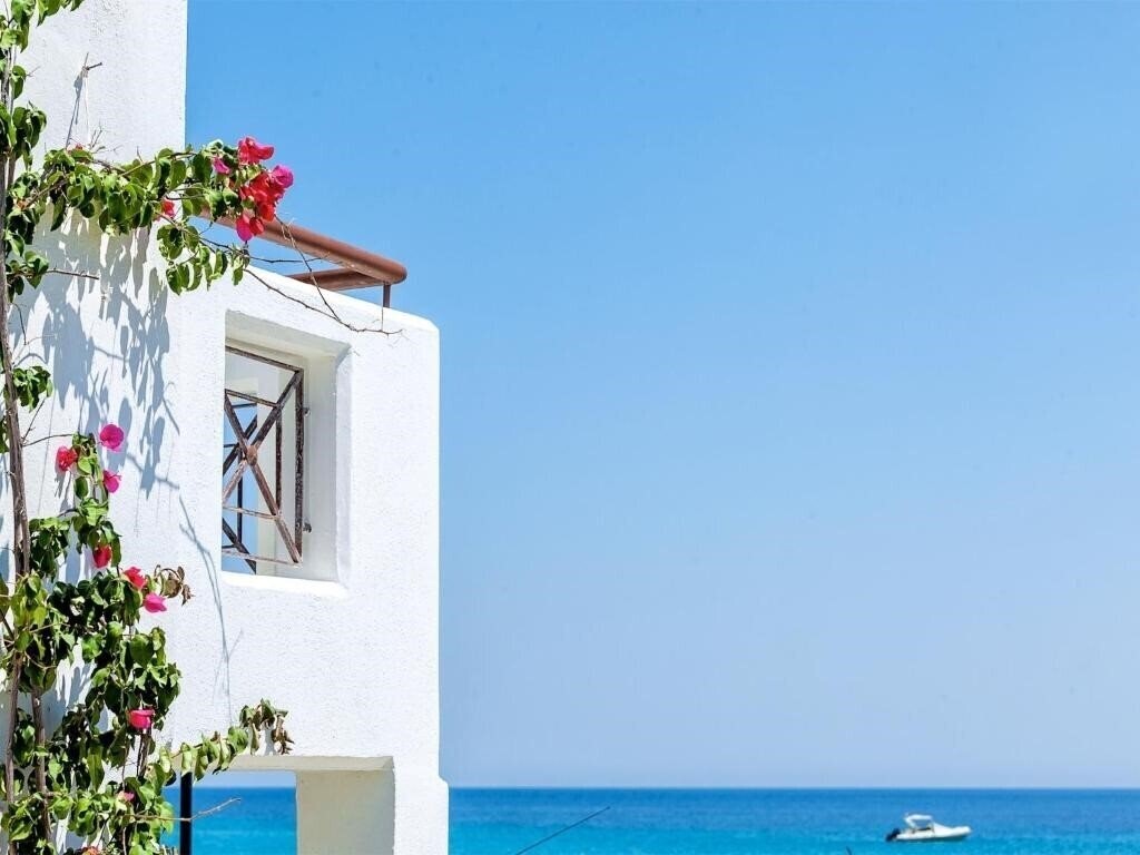 Картинка Xenios Dolphin Beach 3*