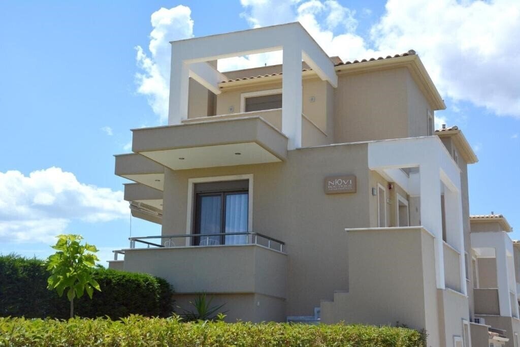 Апартаменти Niovi Boutique Apartments 4*