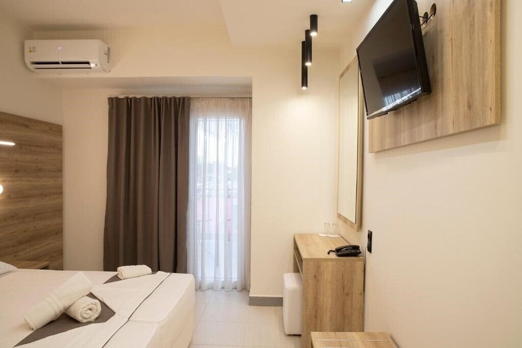 Апартаменты Dafni Plus Hotel 4*