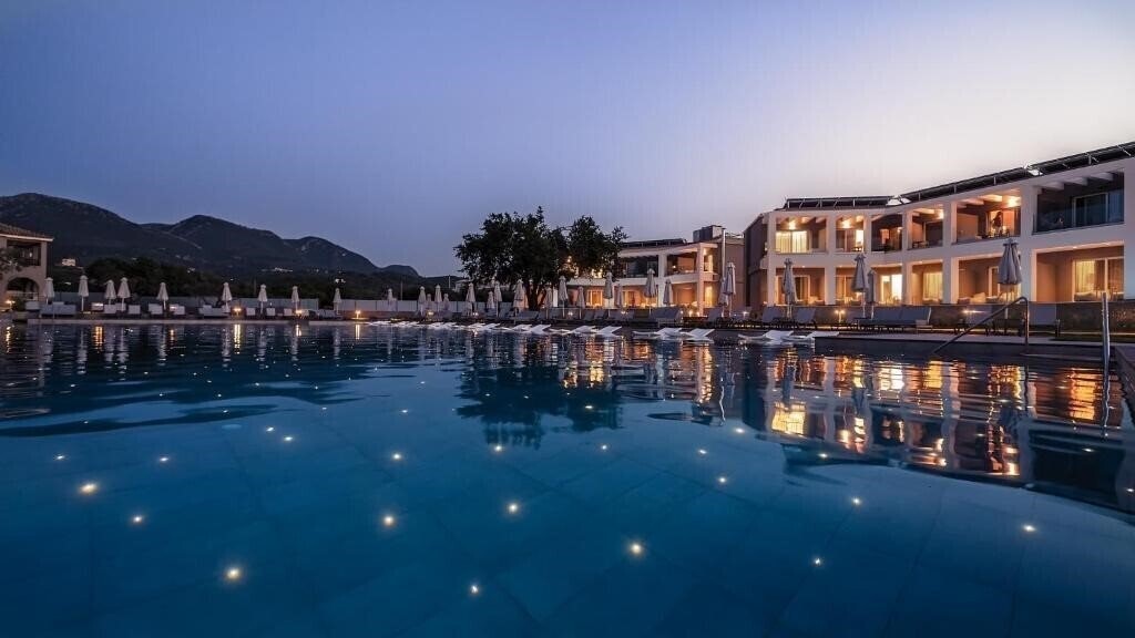 Фотографія Acharavi Beach Hotel 4*