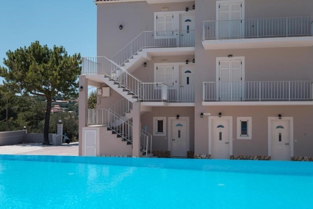 Фото Kouros Apartments & Studios 4*