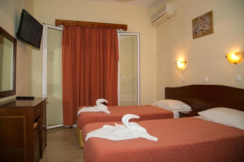 Апартаменты Kouros Apartments & Studios 4*