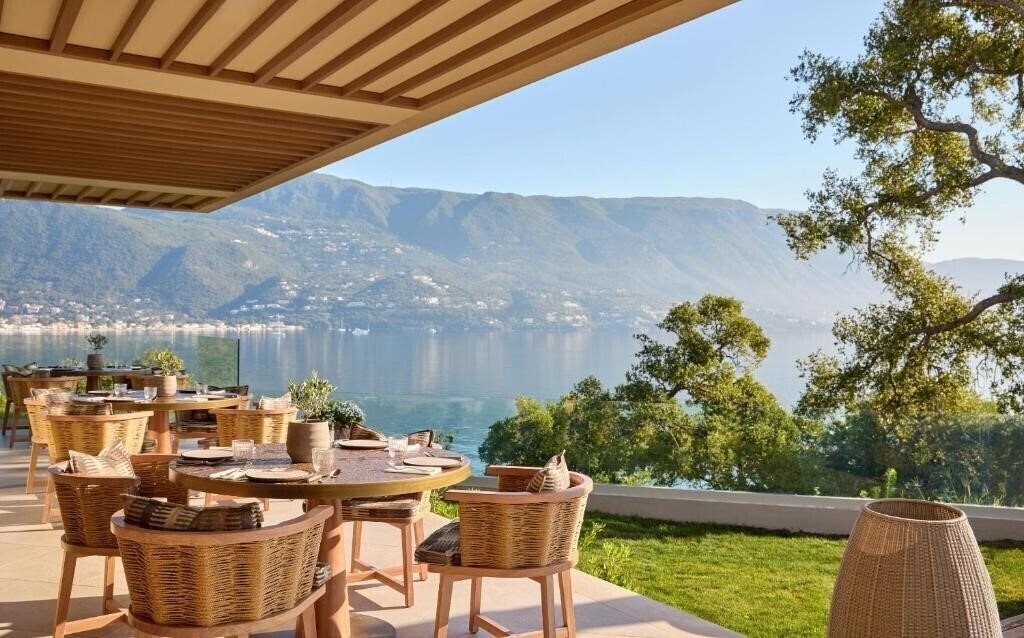 Апартаменти Ikos Odisia 5*