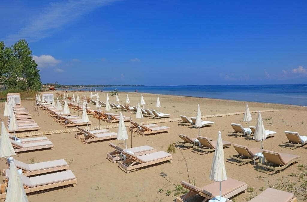 Апартаменты Cavomarina Beach 4*