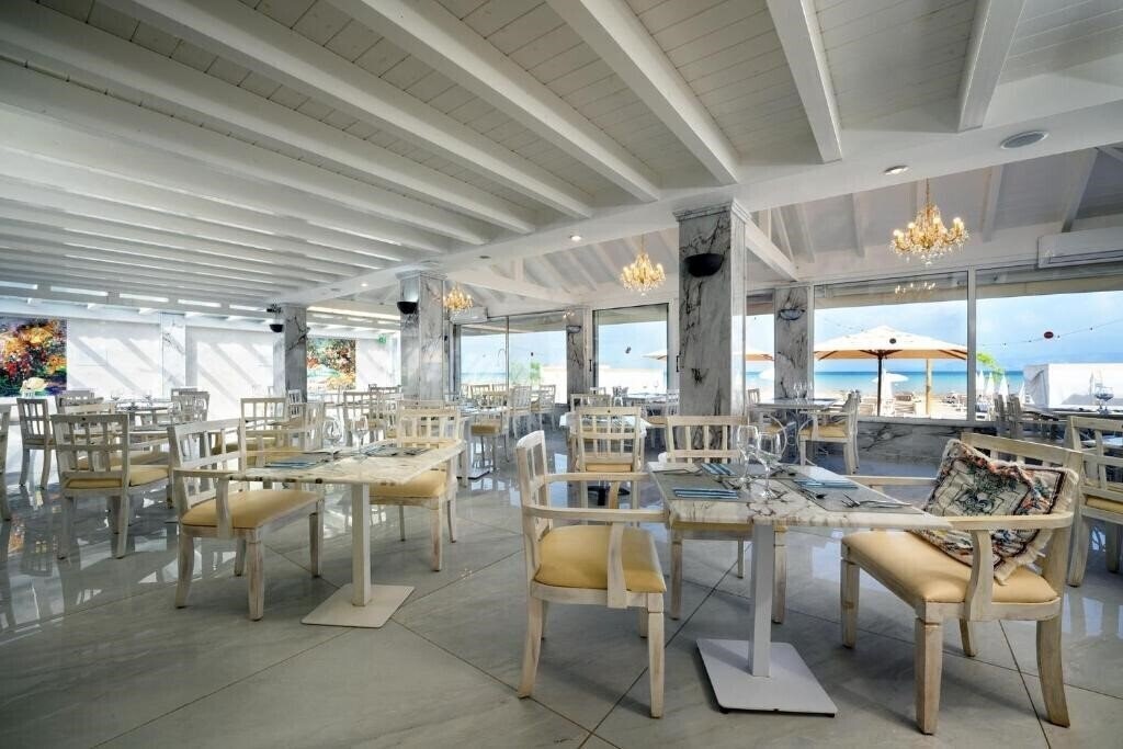 Панорама Cavomarina Beach 4*