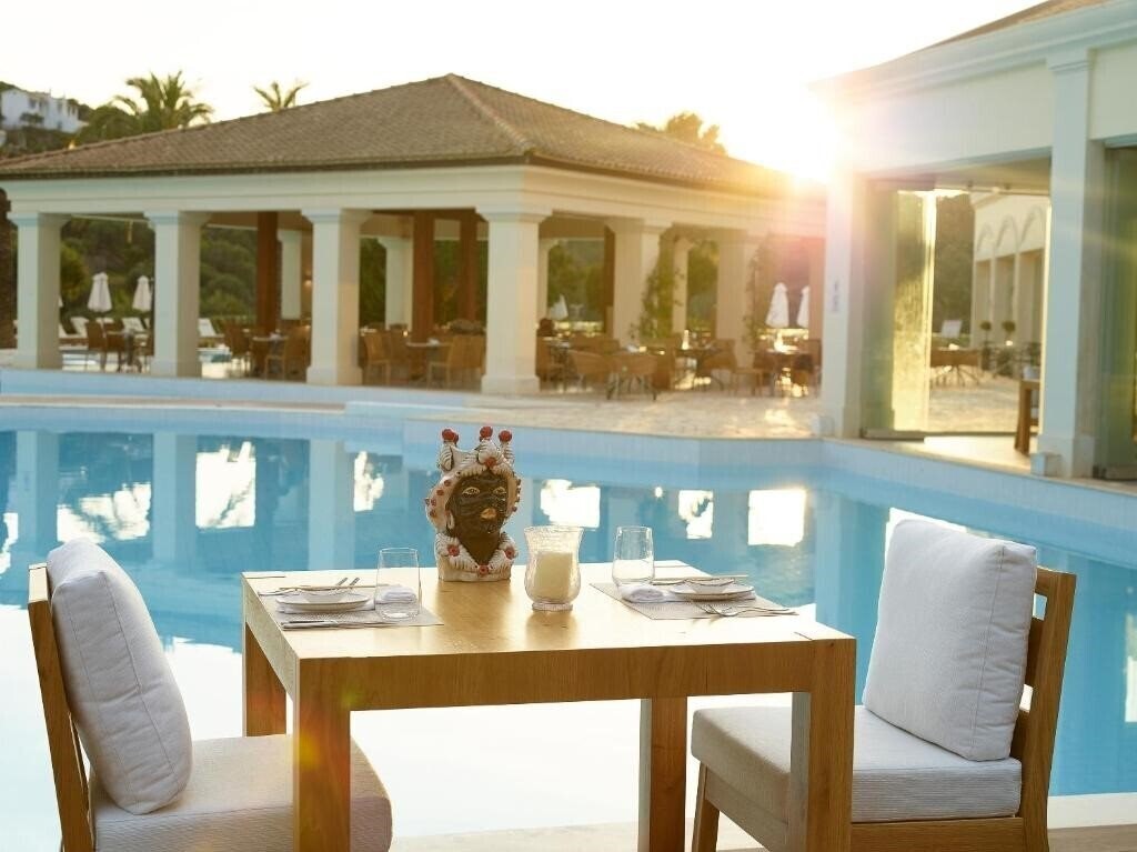 Апартаменты Grecotel Eva Palace 5*