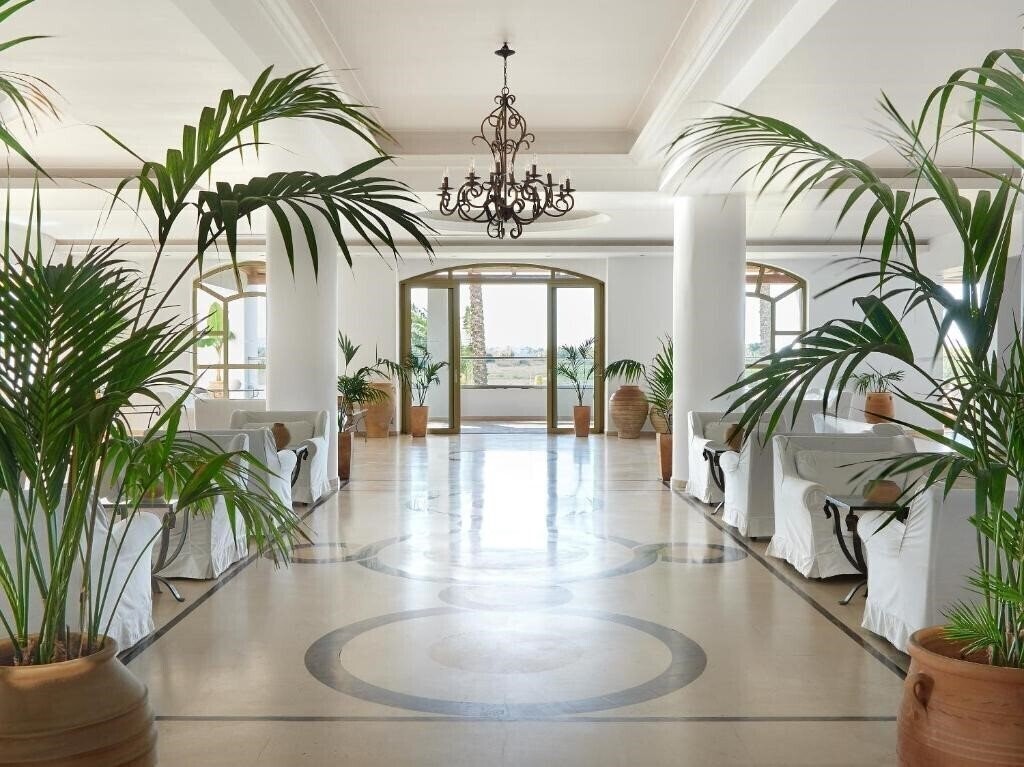 Фотография Grecotel Casa Paradiso 4*