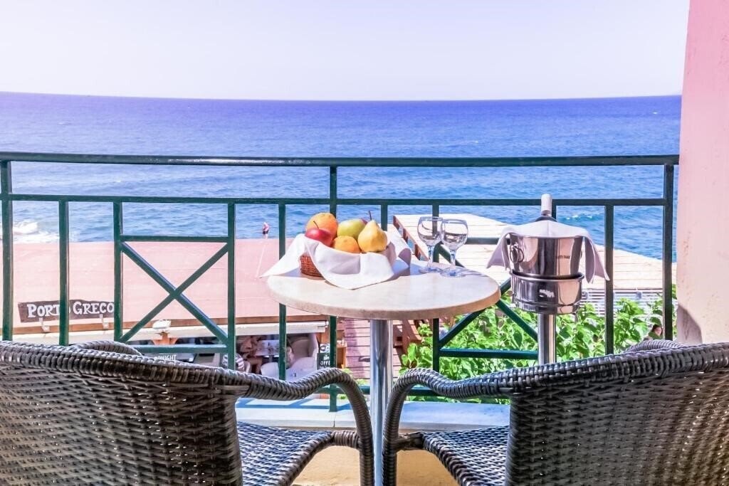 Апартаменти Porto Greco Village Beach Hotel 4*