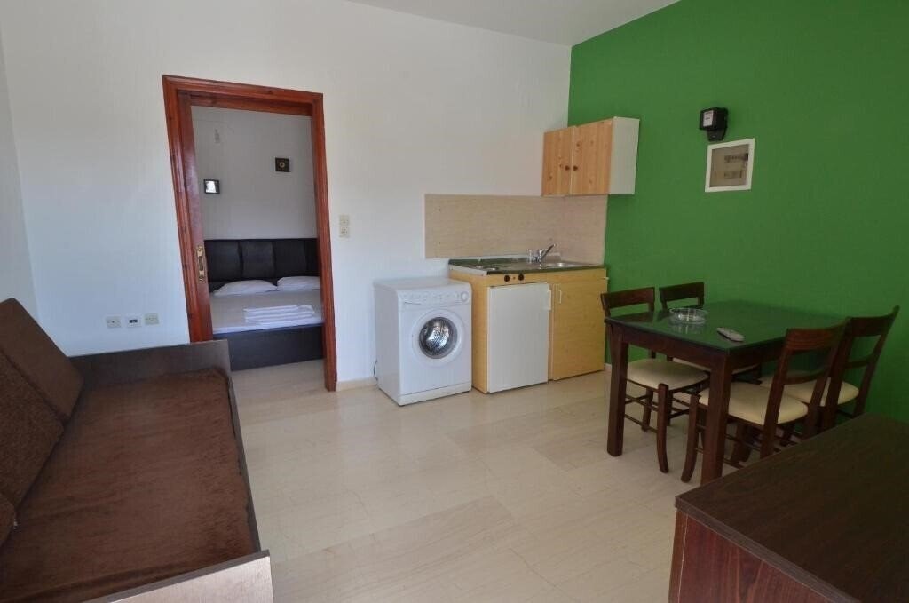 Фотографія Manos Apartments апартаменты