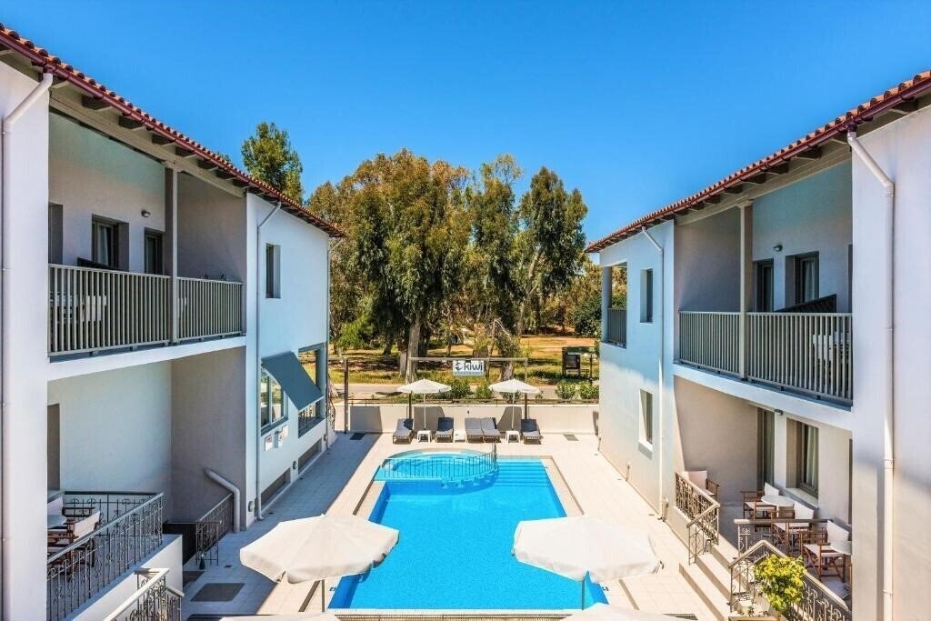 Фотографія Kiwi Apartments 3*