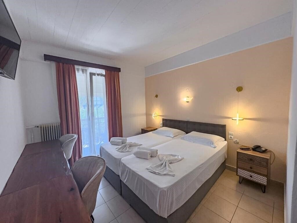 Отель Aquamare Molyvos Hotel 4*