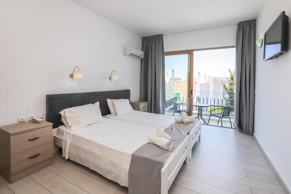 Фото Loutanis Hotel 3*