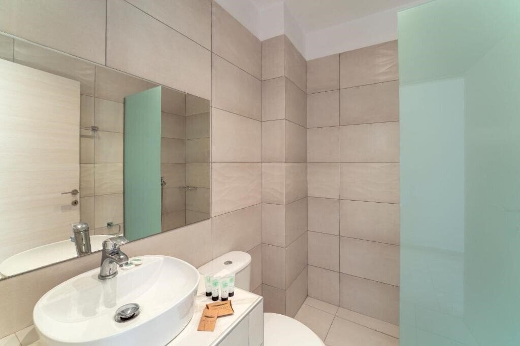 Фотография Beach Break Boutique Apartments 3*