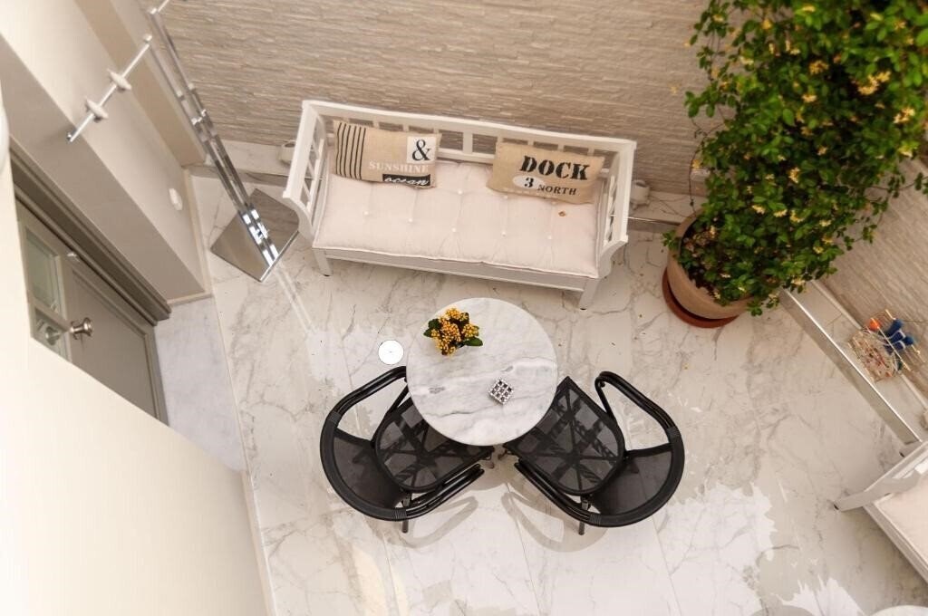 Апартаменты Faces Art Suites 4*