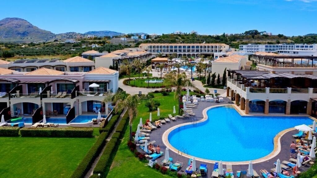 Отель Mythos Beach Resort 5*