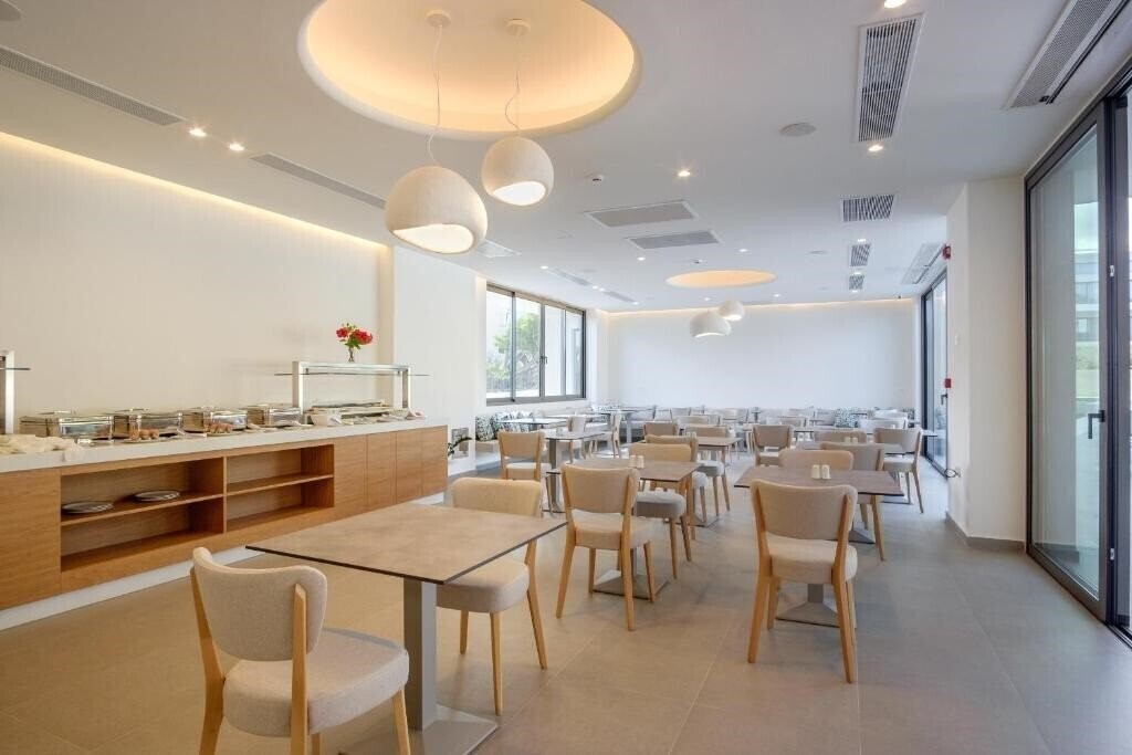 Фотографія Phos Hotel 4*