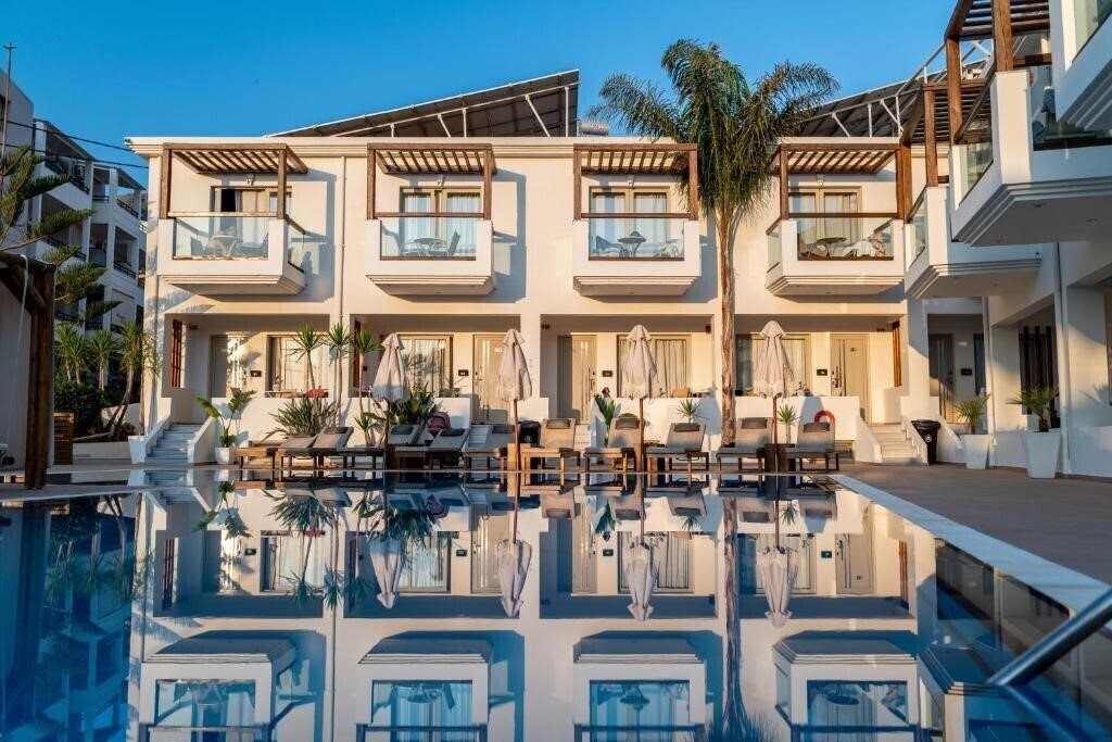 Фото Nostos Beach Boutique Hotel 4*