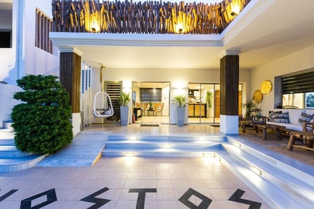 Апартаменты Nostos Beach Boutique Hotel 4*