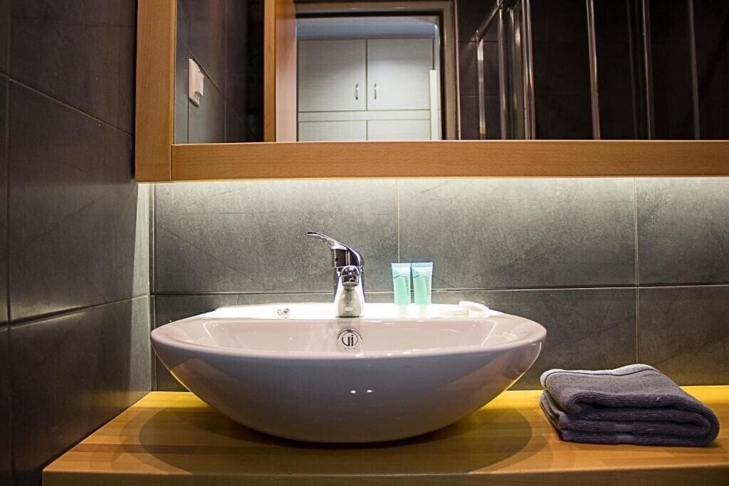 Апартаменты Athlos Hotel 4*